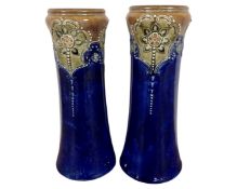 A pair of Royal Doulton Lambeth vases, height 22.5cm.