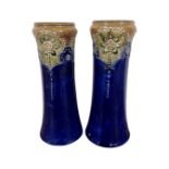 A pair of Royal Doulton Lambeth vases, height 22.5cm.