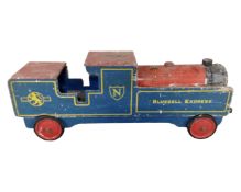 A vintage wooden Bluebell Express toy train.