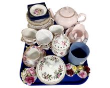 A tray containing assorted ceramics including china flower posies, bone tea china,