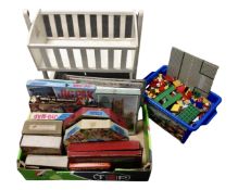 A mid century rocking doll's cot together with a box of Lego and box of vintage jigsaw including
