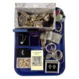 A tray containing a jewellery box with a quantity of costume jewellery including pendants on chains,