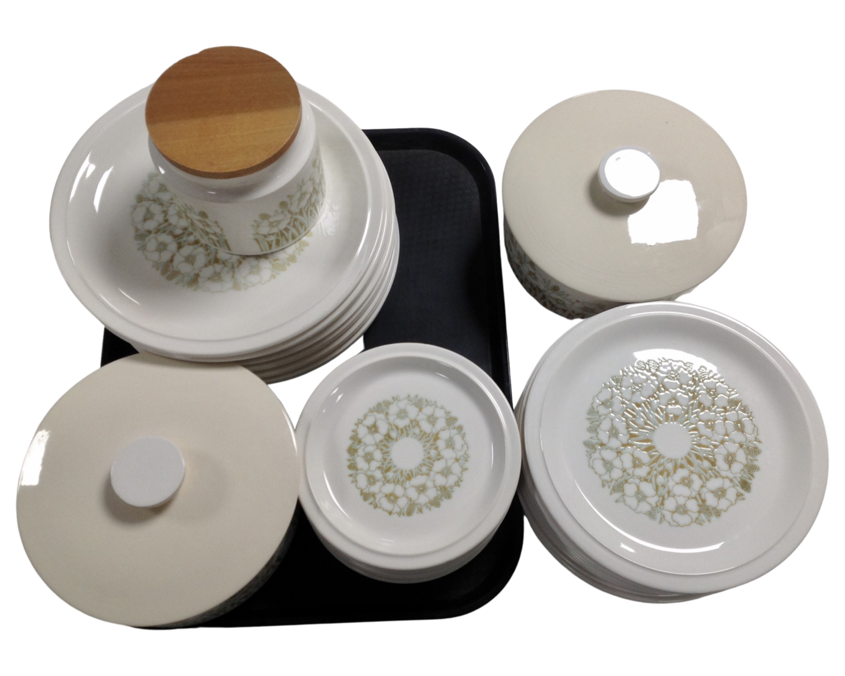 A Hornsea Fleur 32 piece dinner service together with a matching storage jar.