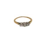 An antique 18ct gold three stone diamond ring, approx. 0.