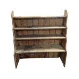 A set of antique pine waterfall bookshelves