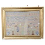 A 19th century gilt framed alphabet sampler, 55cm by 39.5cm.