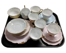 A Windsor 21 piece bone china harlequin tea service.