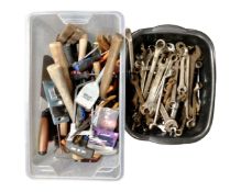 Two plastic tubs containing a large quantity of assorted hand tools and spanners.