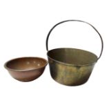 A brass cast iron handle jam pan together with a copper bowl.