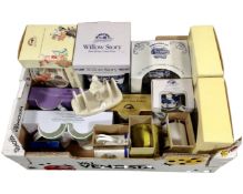 A box containing a quantity of boxed and unboxed Ringtons china including jugs, vases, plaques,