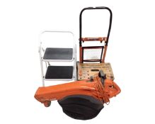A Flymo garden vac together with a power devil trolley truck,