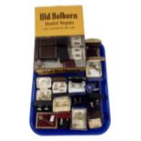 A vintage Old Holborn cigarette tin together with a large quantity of assorted cufflinks.