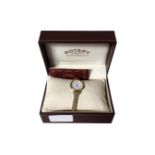 A lady's gold plated Rotary wristwatch in box.