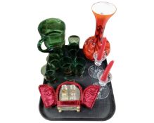 A tray of glass ware, green glass jug with beakers,