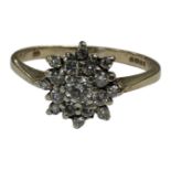 A 9ct gold diamond set cluster ring, size O. CONDITION REPORT: 2.