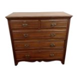 An Edwardian mahogany five drawer chest