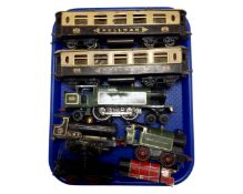 A tray containing Hornby Tri-ang tin plate engines including 6600 and 2221 Great Western,