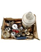 A box containing a brass oil lamp with chimney and shade (electric), dressing table brushes,