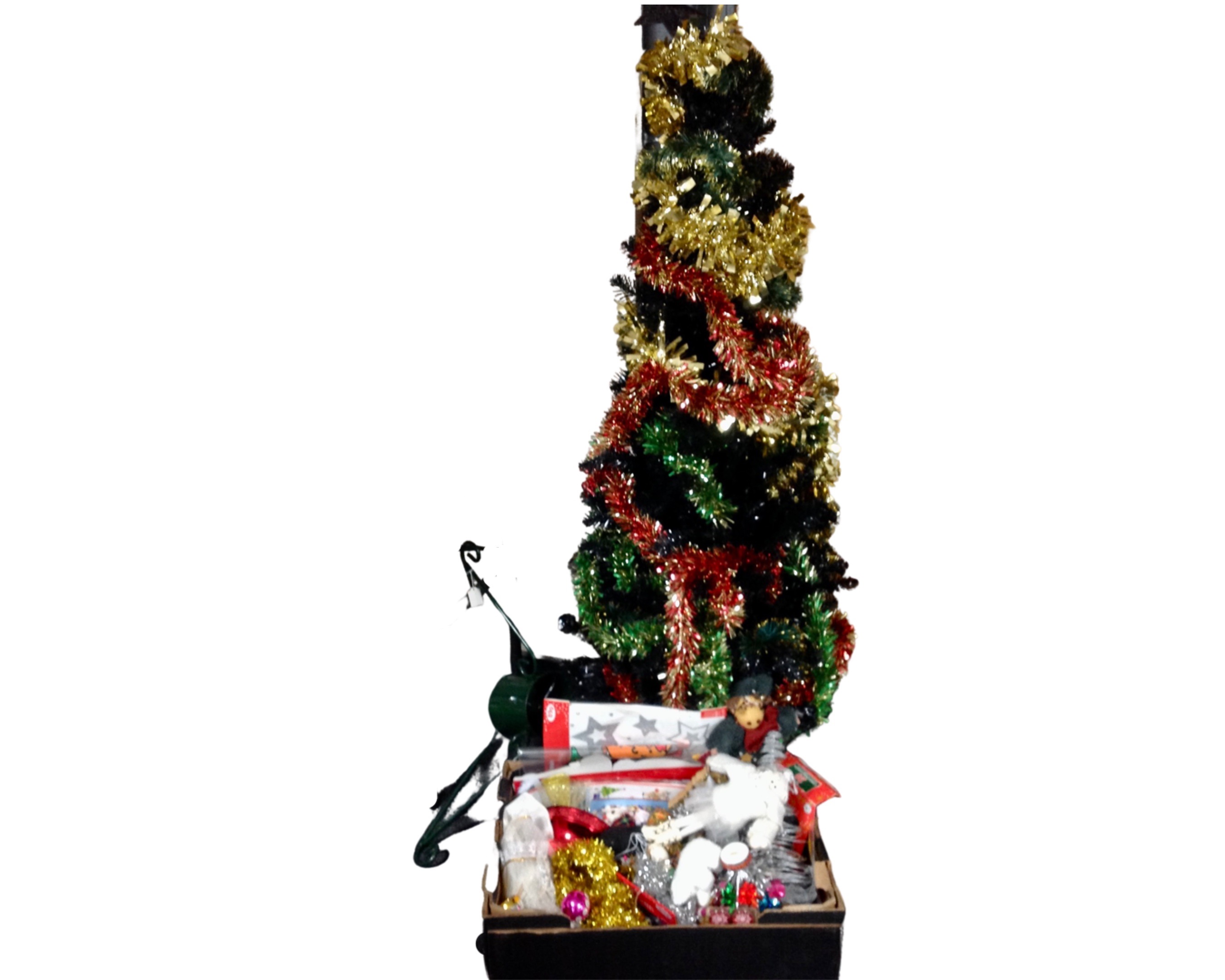 A 5' Christmas tree with tinsel together with a metal Christmas tree stand a box containing