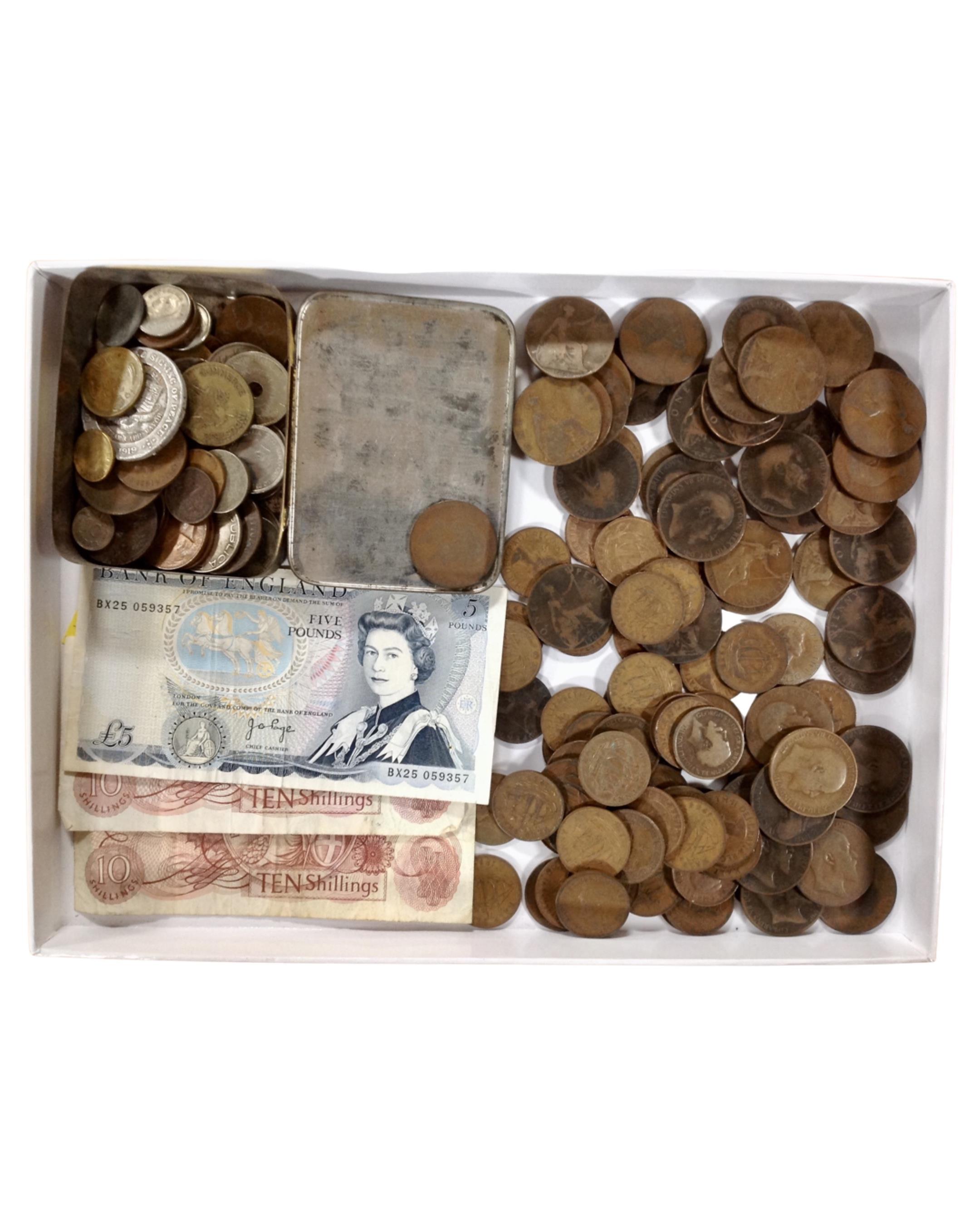 A collection of 19th century and later coins, halfpennies together with a £5 note,
