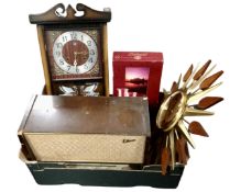 A box containing a valve radio, contemporary eight day wall clock, sunburst clock,