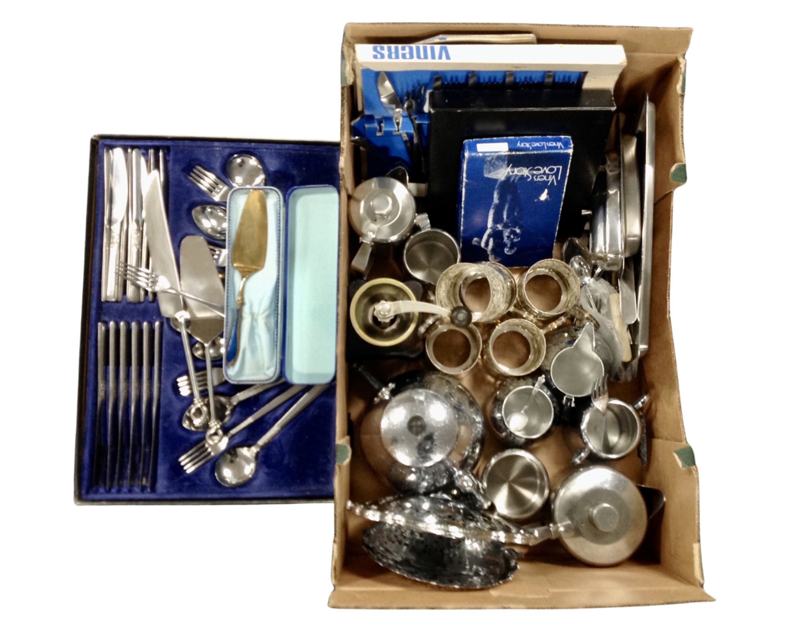 A boxed set of Viners cutlery together with a further box containing further plated wares,