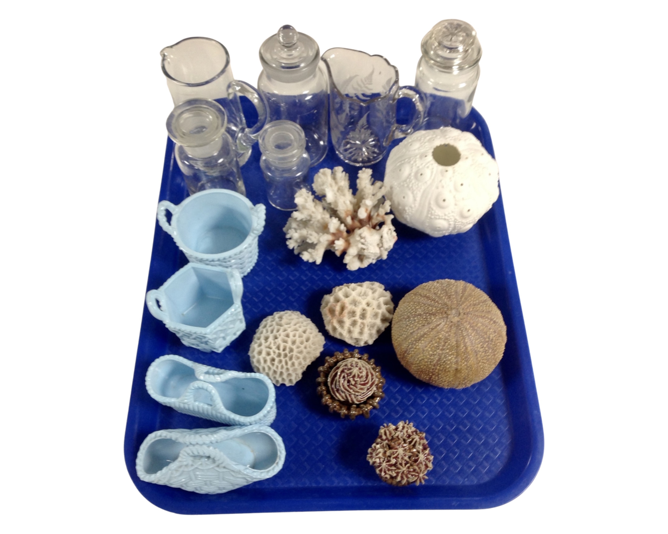 A tray containing coral shells, apothecary jars, Sowerby glass etc.