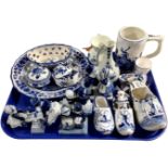 A tray containing a collection of Delft china.