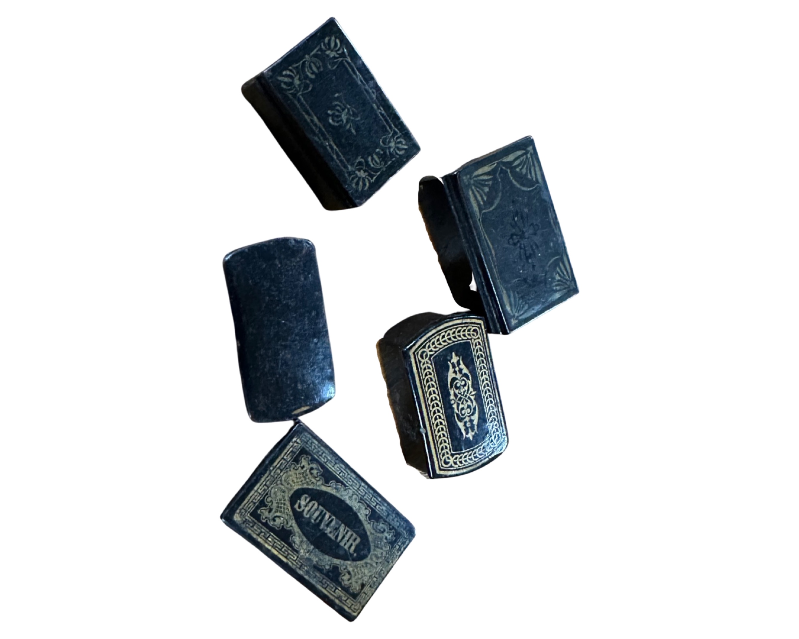Five antique ebonised snuff boxes.