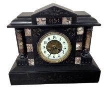 A late 19th century black slate and marble mantel clock.