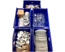 Five plastic storage crates containing a large quantity of white dinner china, drinking ,