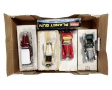 A box of Merit planet gun, together with four large scale die-cast classic cars, all parts boxed.