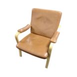 A Danish Skalma bentwood framed armchair in tan leather