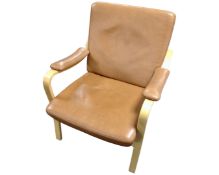 A Danish Skalma bentwood framed armchair in tan leather