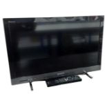 A Sony Bravia 24" LCD TV with remote.