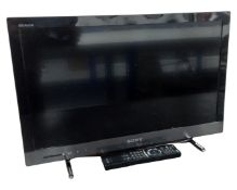 A Sony Bravia 24" LCD TV with remote.