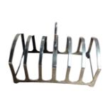 A silver six slice toast rack, London hallmarks (84.