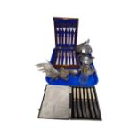 A tray of three piece plated tea service, metal bird ornaments,