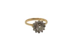 An 18ct gold diamond cluster ring, the central stone approx. 0.