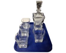 A square crystal whisky decanter together with a set of four matching glasses.