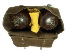 A pair of Jacques of London lawn bowls, size 36, in canvas bag.