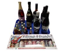 A tray containing assorted alcohol including Cava, Prosecco, Lambs Navy Rum, miniature bottles,