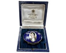 A silver and enamel pill box depicting Robert Burns, by Toye Kenning & Spencer Ltd, London, boxed.
