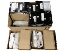 A box containing seven pairs of Lady's Adidas trainers, boxed,