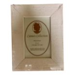 One crate containing thirty nine Cameo Collection 6" x 4" white wood photo frames,