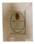 One crate containing thirty nine Cameo Collection 6" x 4" white wood photo frames,