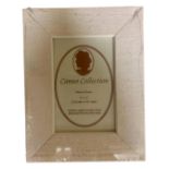 One crate containing forty six Cameo Collection white wood 6" x 4" photo frames,