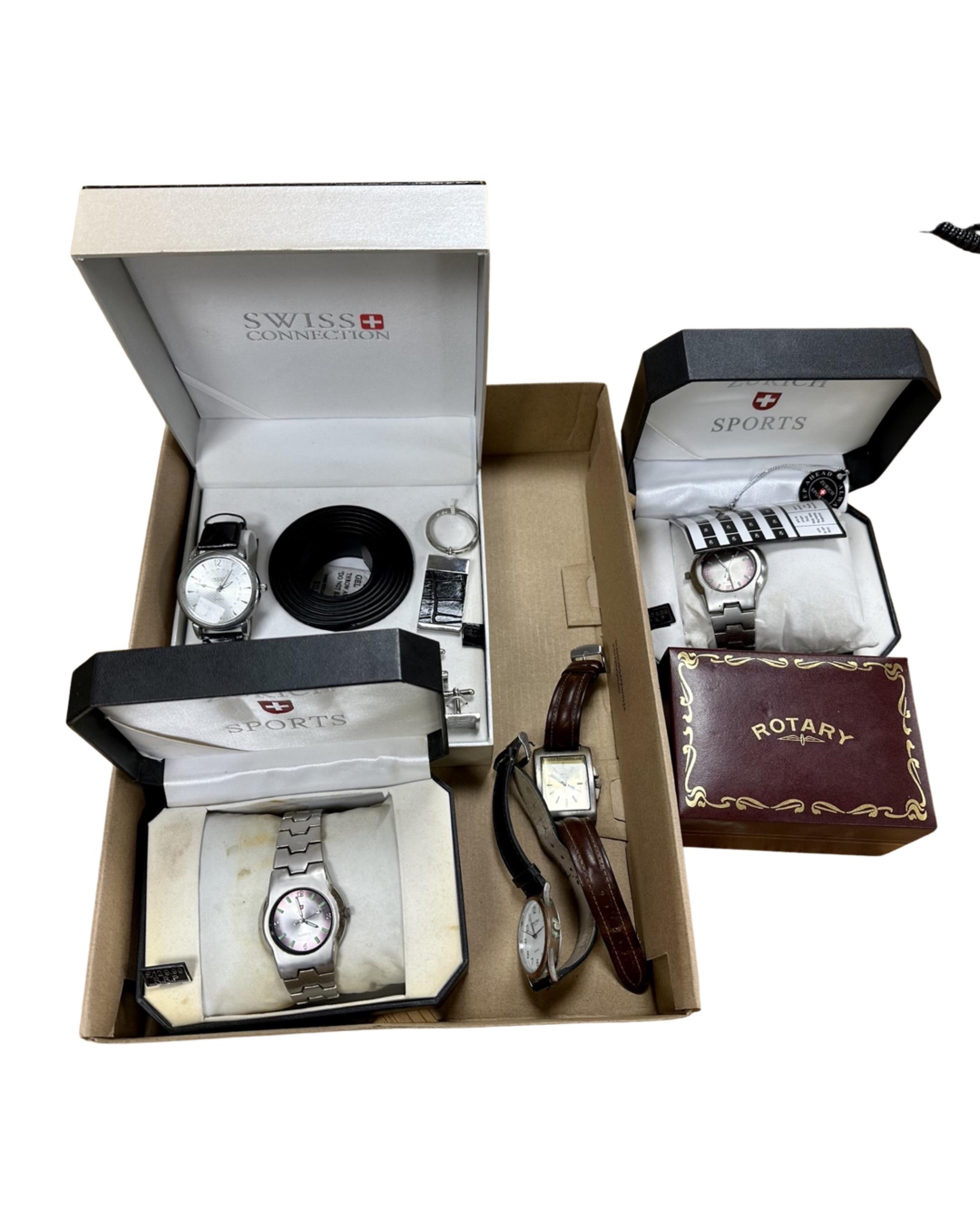 A boxed Swiss Connection gent's wristwatch set, two further Zurich Sports watches,