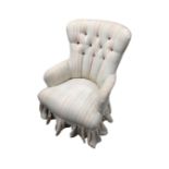 A Victorian style lady's chair in striped buttoned fabric