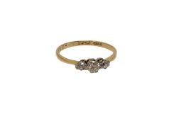 An 18ct gold three stone diamond ring, size O CONDITION REPORT: 1.